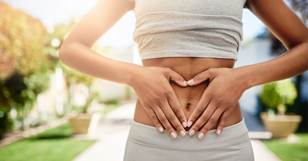Woman holding her stomach